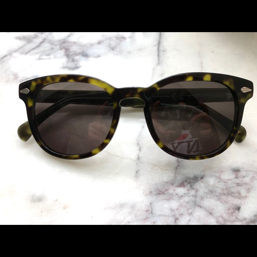 Green tortoise shell sunglasses by J Crew